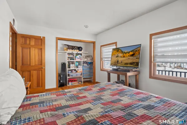 a bathroom with a tub and shower