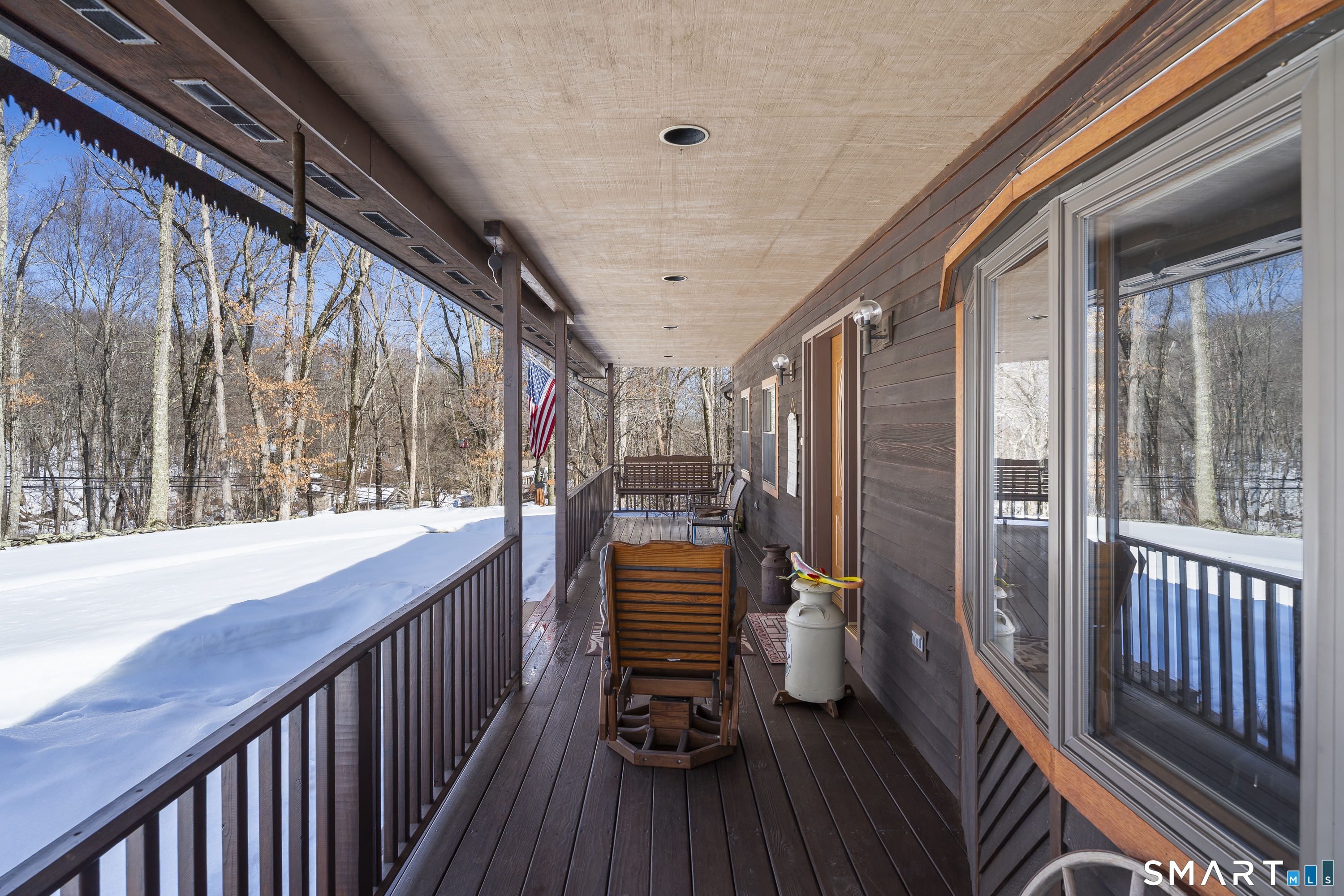172 Old Willimantic Road Columbia, CT 06237 - Photo 2 of 39 a view of two chairs in the balcony