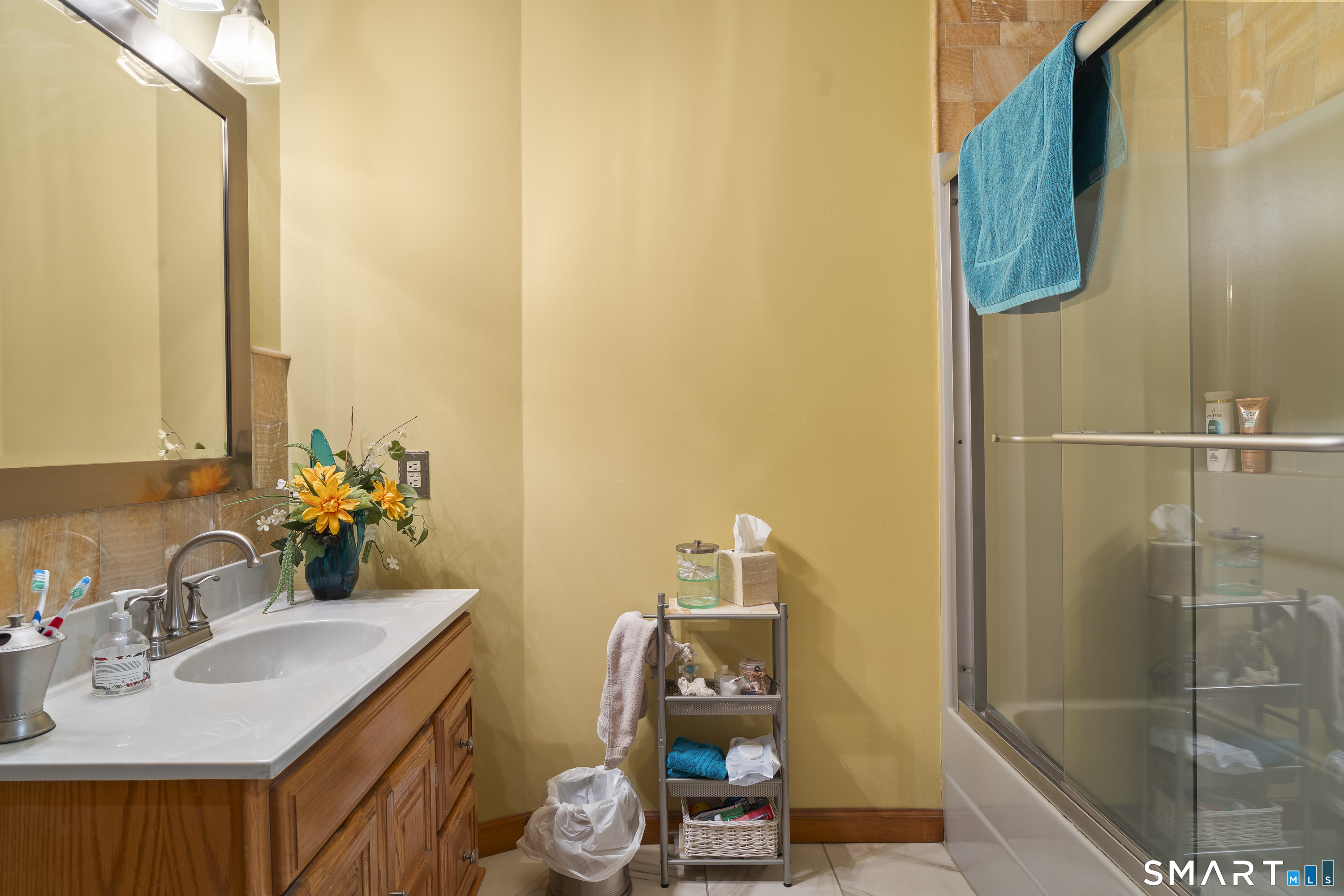 172 Old Willimantic Road Columbia, CT 06237 - Photo 22 of 39 a bathroom with a sink and a mirror