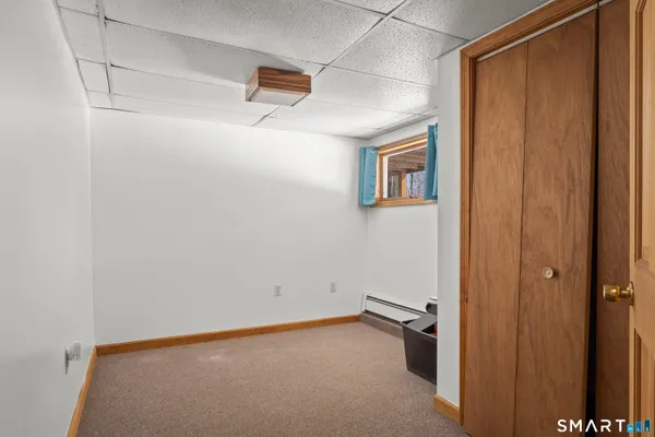 a view of a workspace with furniture