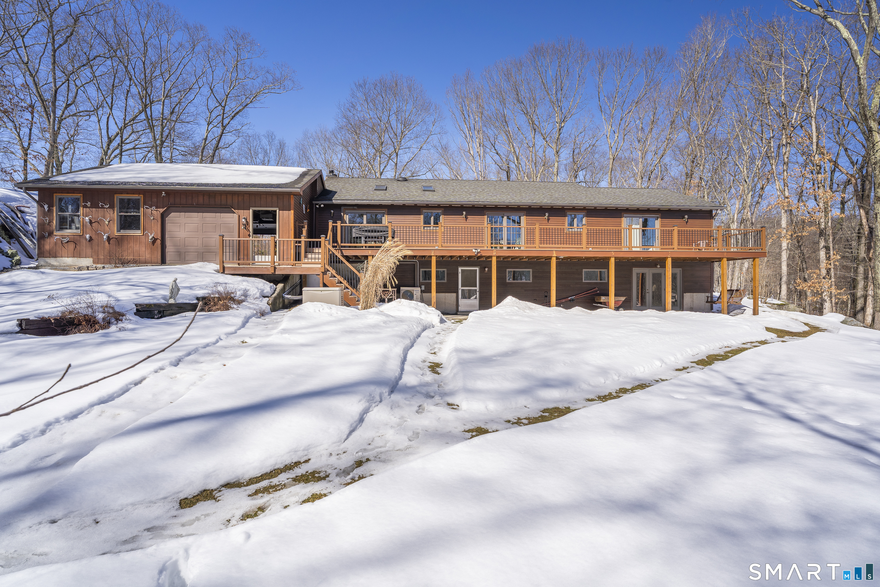172 Old Willimantic Road Columbia, CT 06237 - Photo 6 of 39 a view of large house with a patio