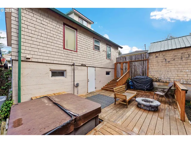 a backyard of a house with seating space