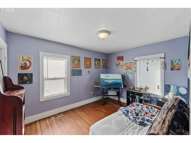 a workspace with furniture and window