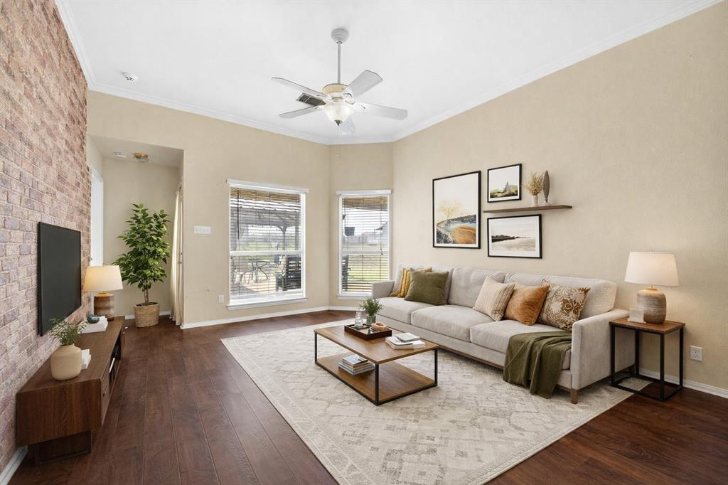 13616 Bates Aston Road Haslet, TX 76052 - Photo 23 of 36 a living room with furniture large window and a flat screen tv
