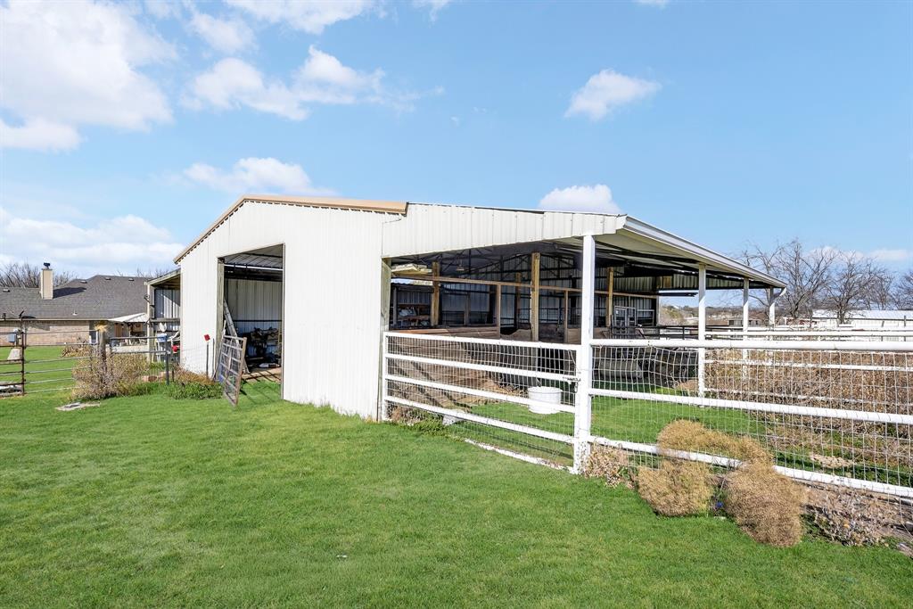 13616 Bates Aston Road Haslet, TX 76052 - Photo 8 of 36 a front view of a house with a yard