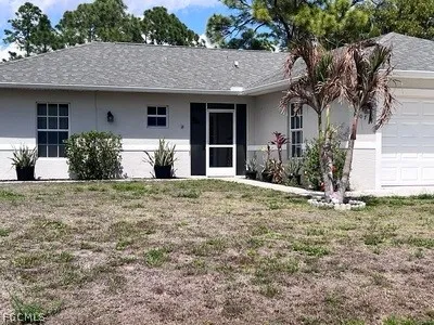 $2,100 | 1107 Enrique Street South, Lehigh Acres, FL 33974