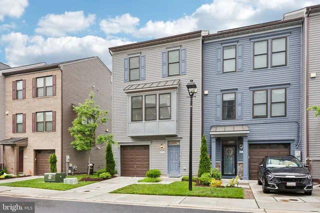 a car parked in front of a brick building