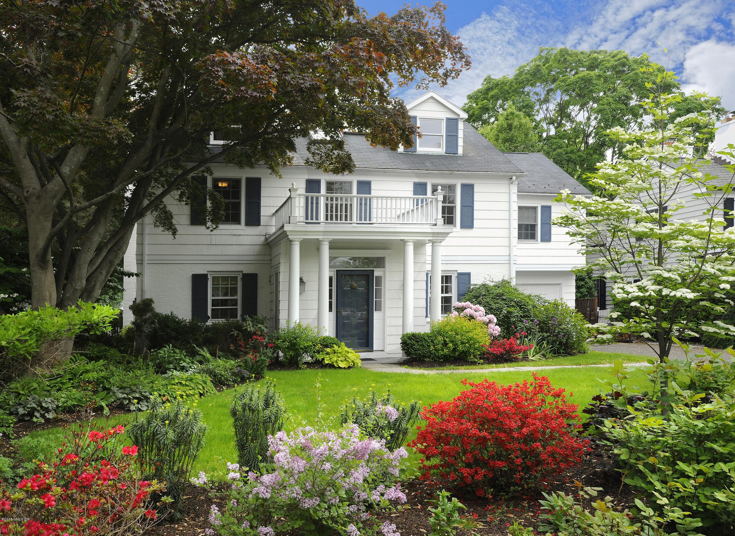 14 Spruce Street Riverside, CT 06878 - Photo 1 of 22 a front view of a house with garden and porch