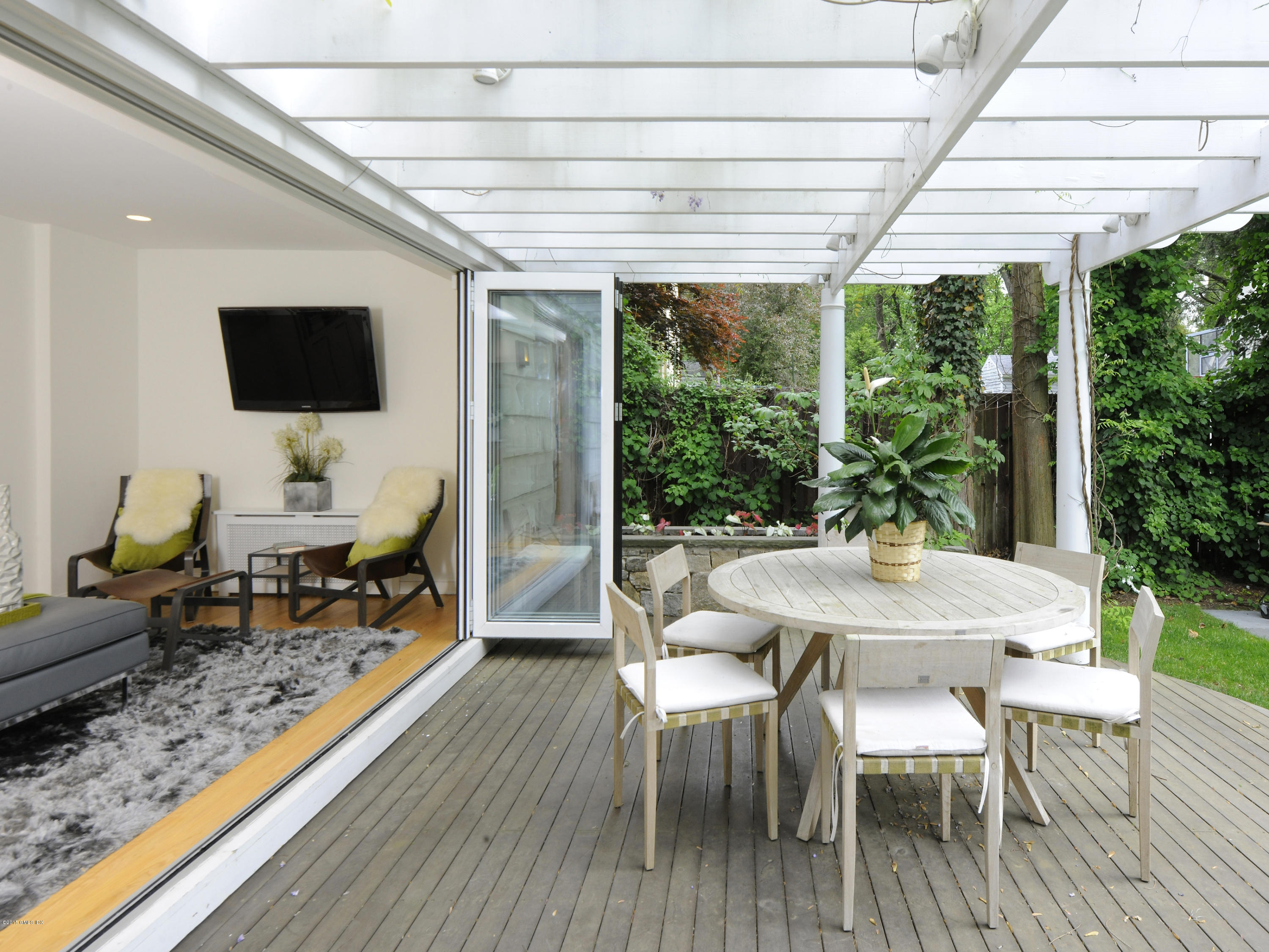 14 Spruce Street Riverside, CT 06878 - Photo 16 of 22 a outdoor space with furniture and wooden floor