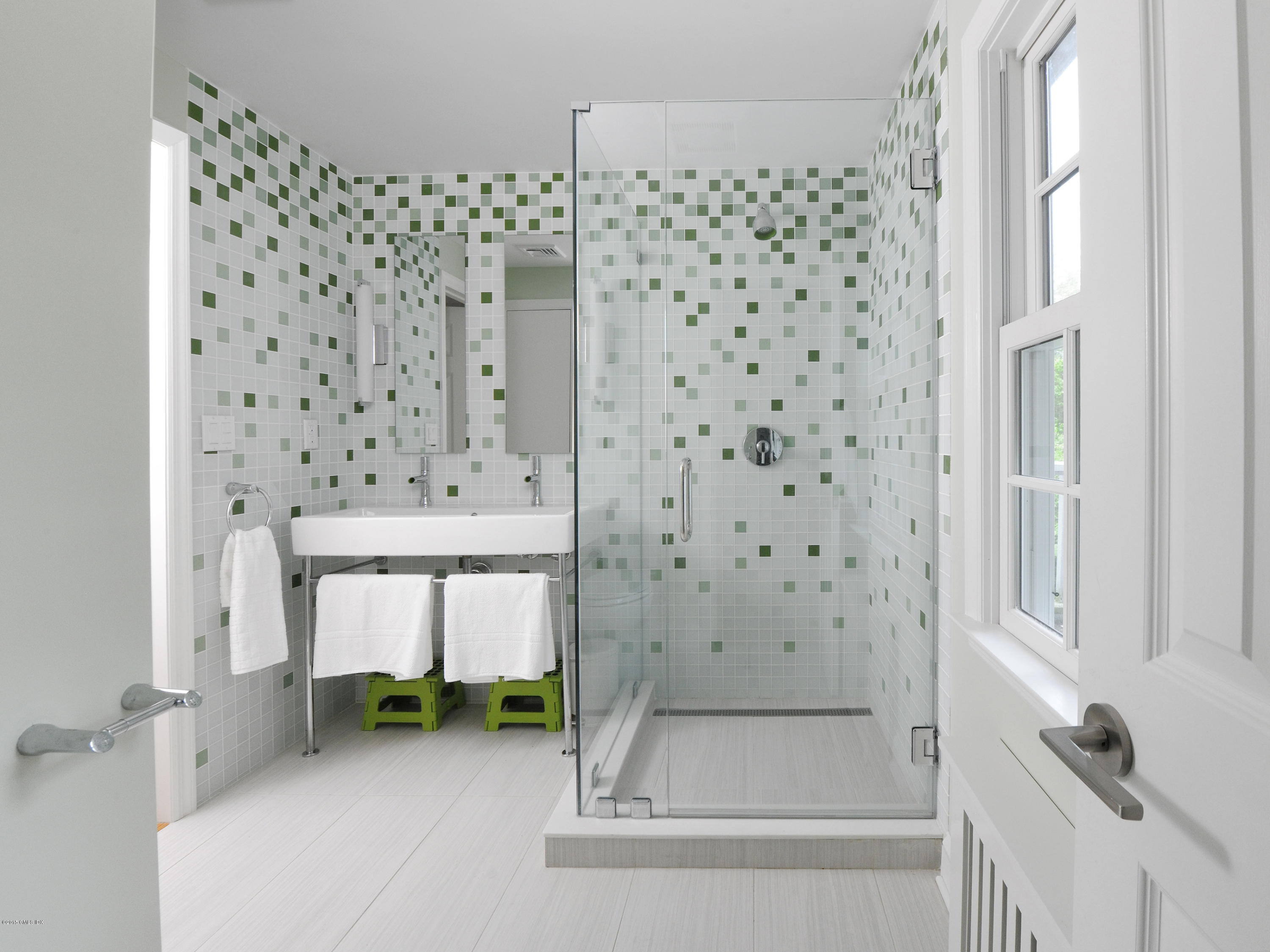 14 Spruce Street Riverside, CT 06878 - Photo 20 of 22 a bathroom with a bathtub and a shower