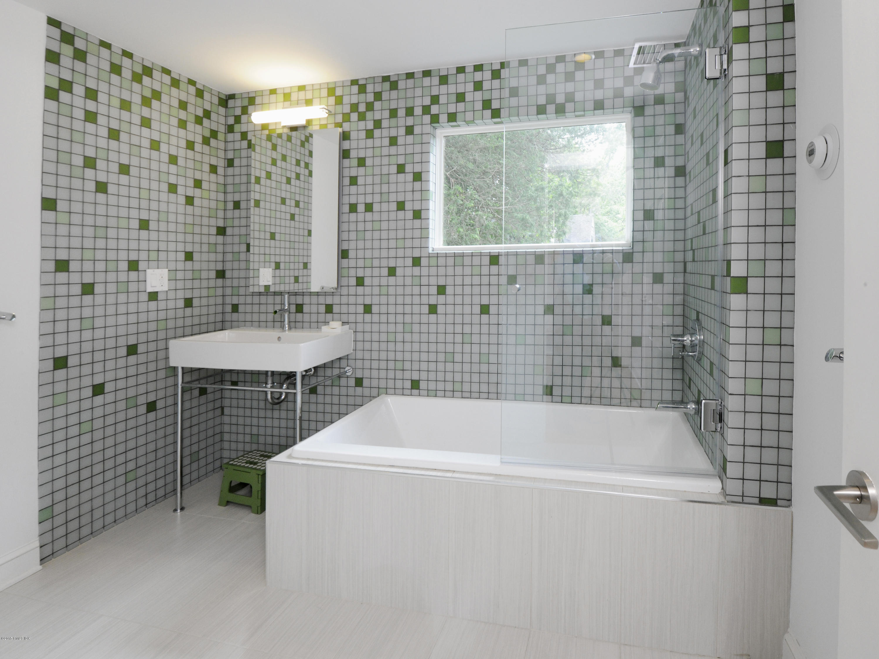 14 Spruce Street Riverside, CT 06878 - Photo 22 of 22 a bathroom with a bathtub and shower