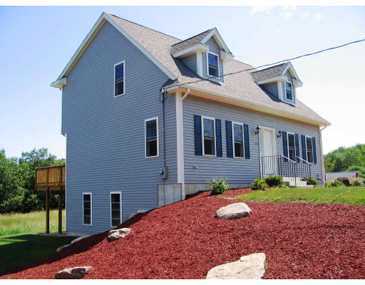 Lot 2 Oakham Road Barre, MA 01005 - Photo 3 of 16 a view of a house with a yard