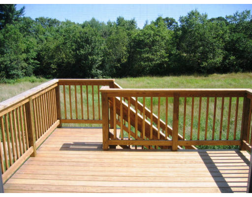Lot 2 Oakham Road Barre, MA 01005 - Photo 7 of 16 a view of balcony with wooden floor and fence