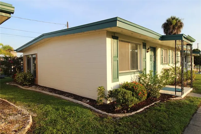 a view of a pathway with a yard