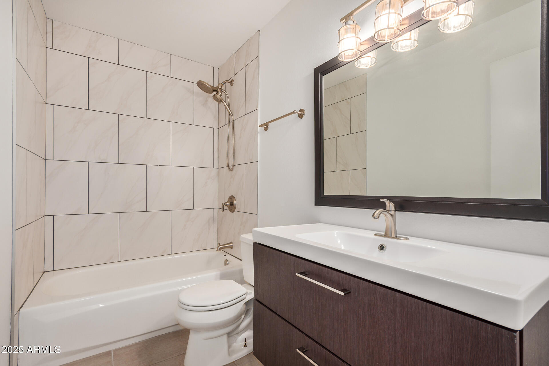 5525 East Thomas Road, Unit C4 Phoenix, AZ 85018 - Photo 25 of 34 a bathroom with a sink a toilet and shower