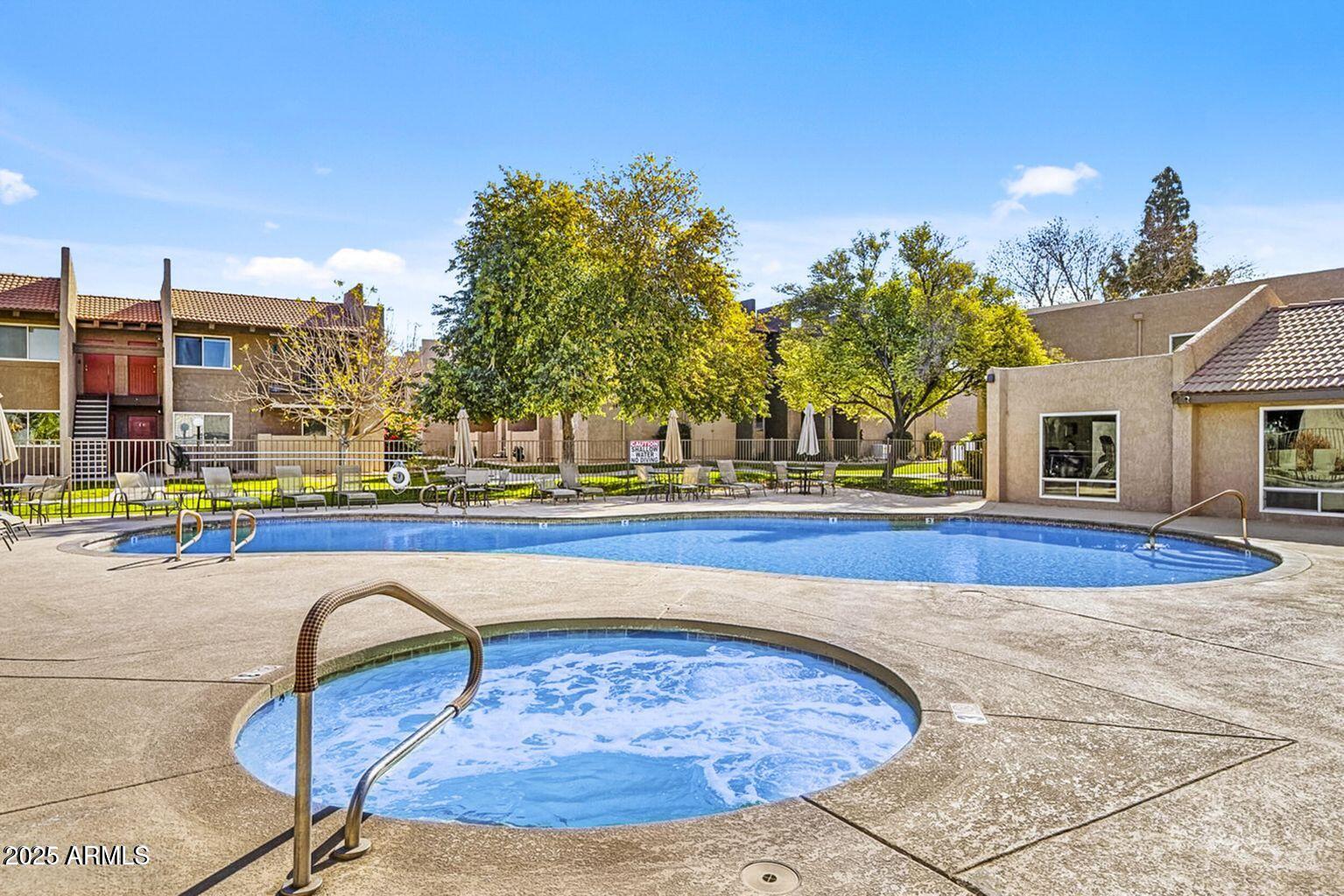 5525 East Thomas Road, Unit C4 Phoenix, AZ 85018 - Photo 34 of 34 a view of outdoor space yard swimming pool and outdoor seating