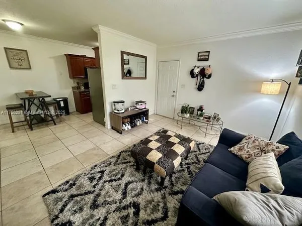 a living room with furniture and a couch