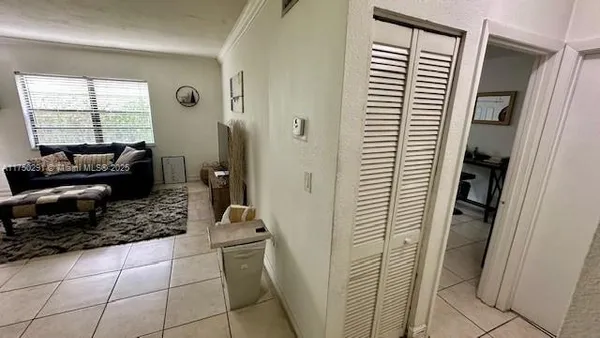 a bathroom with a shower and a sink
