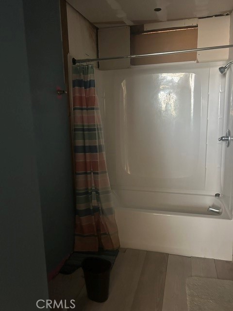 35057 Birch Road Barstow, CA 92311 - Photo 14 of 15 a bathroom with a glass shower door