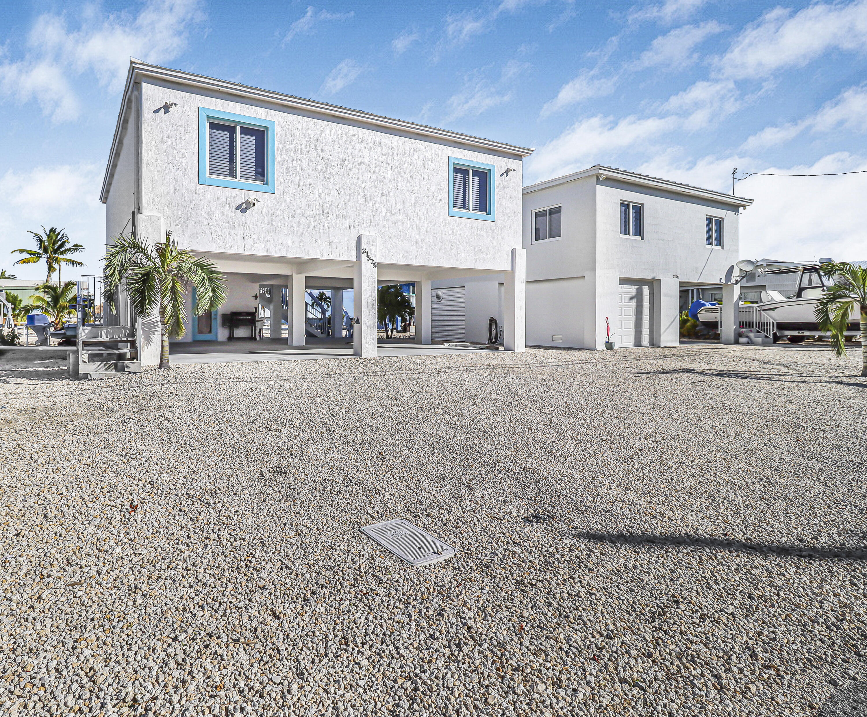 31575 Ave D Big Pine Key, FL 33043 - Photo 2 of 35 a large room with a large window and front door