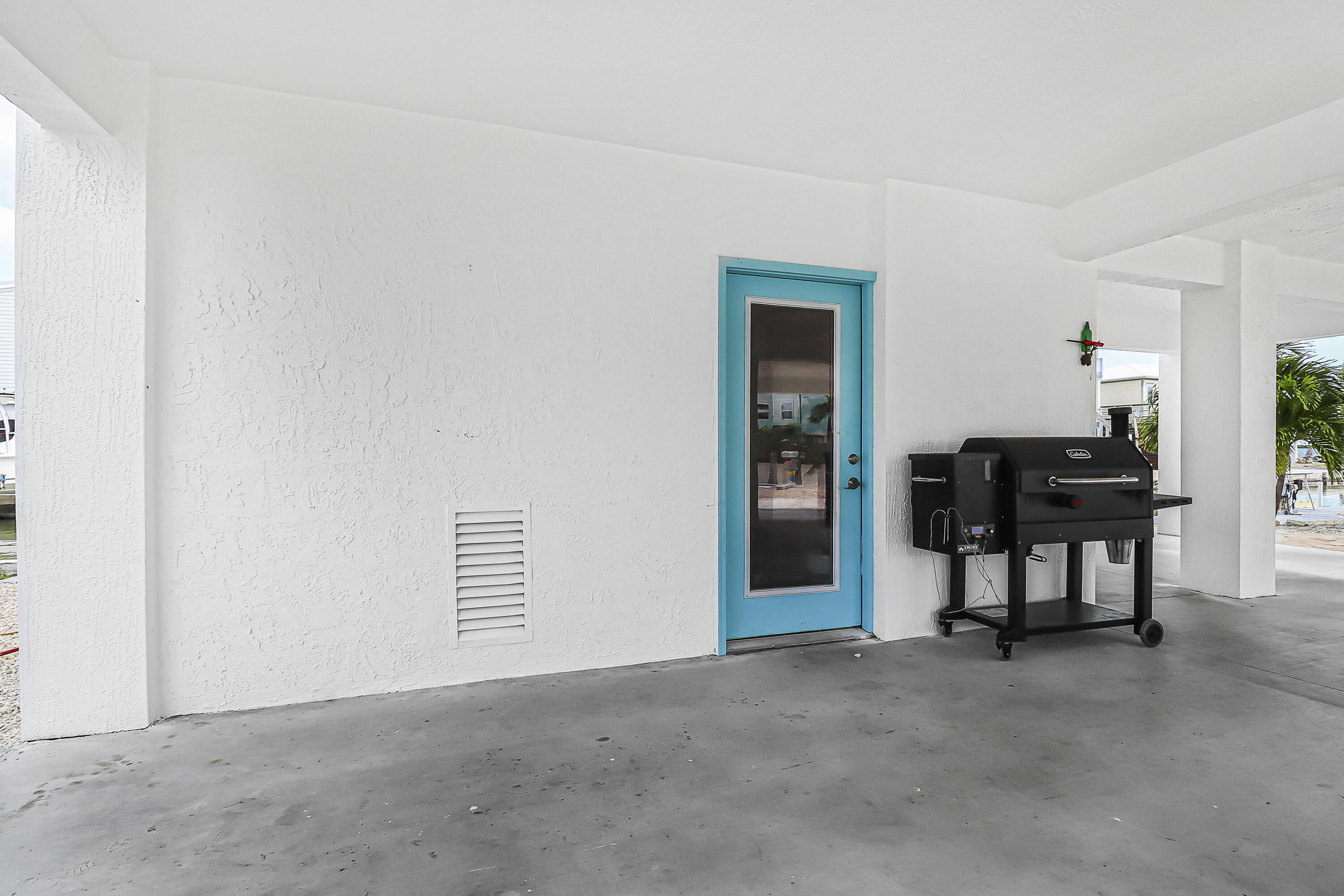 31575 Ave D Big Pine Key, FL 33043 - Photo 23 of 35 a view of a livingroom with furniture and a window