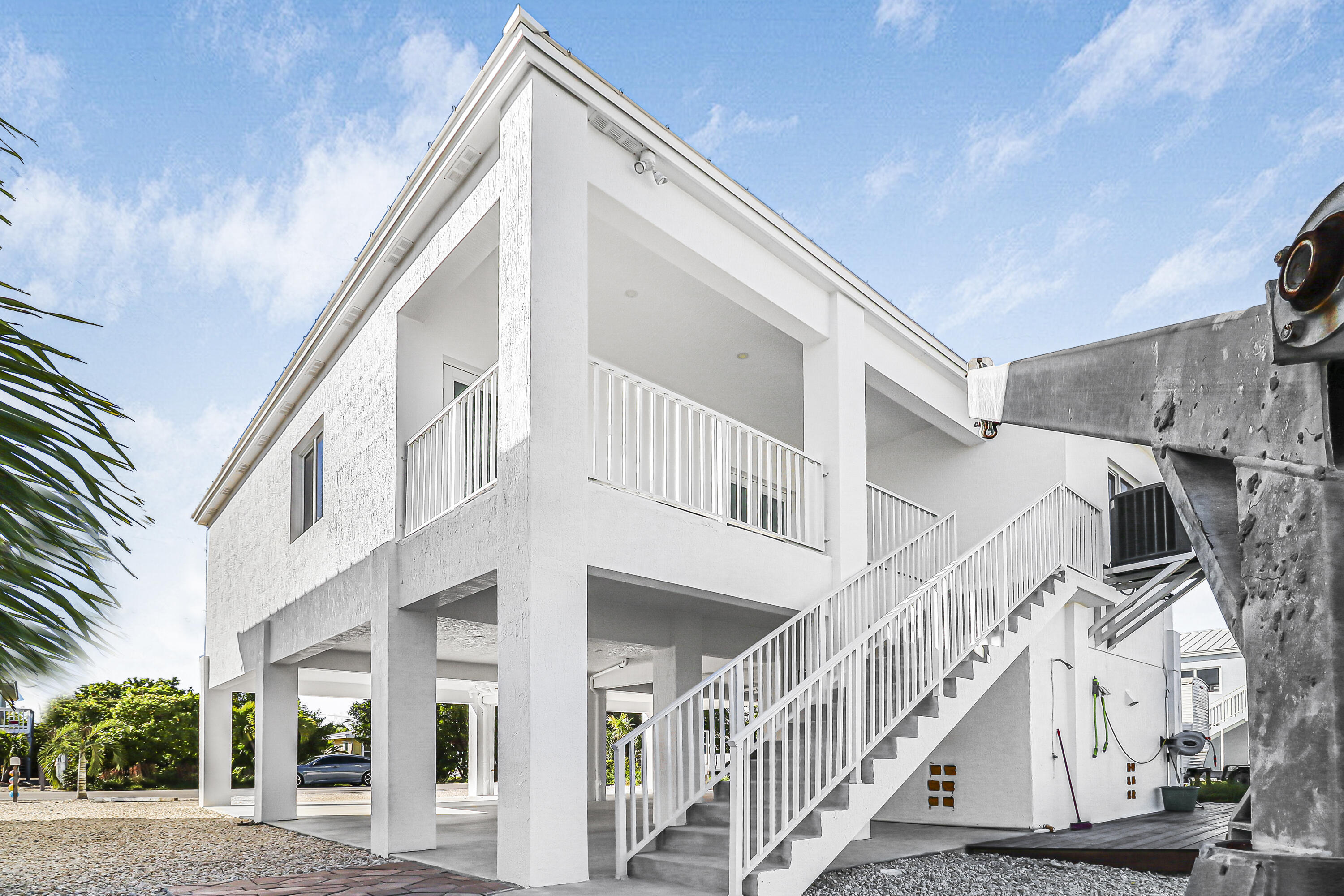 31575 Ave D Big Pine Key, FL 33043 - Photo 6 of 35 a view of a building with a small yard