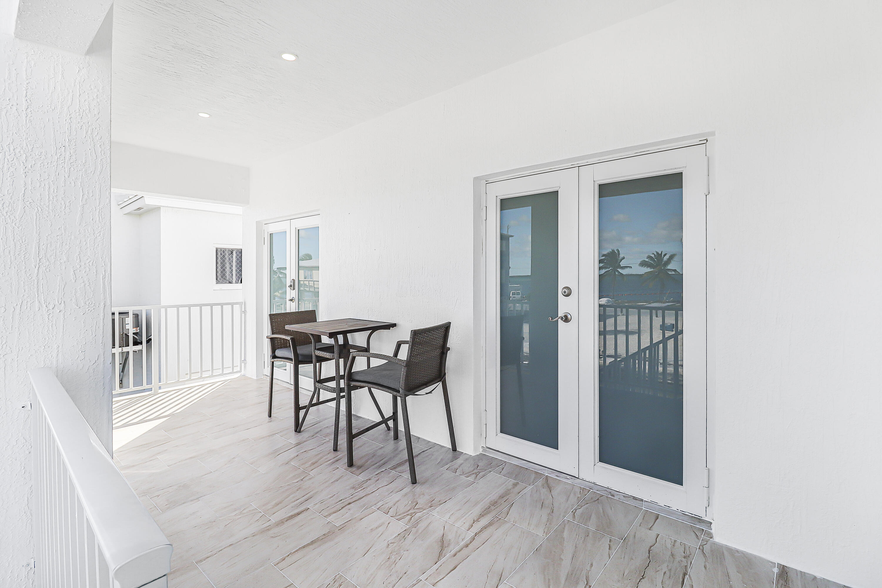 31575 Ave D Big Pine Key, FL 33043 - Photo 7 of 35 a view of a livingroom with furniture and wooden floor