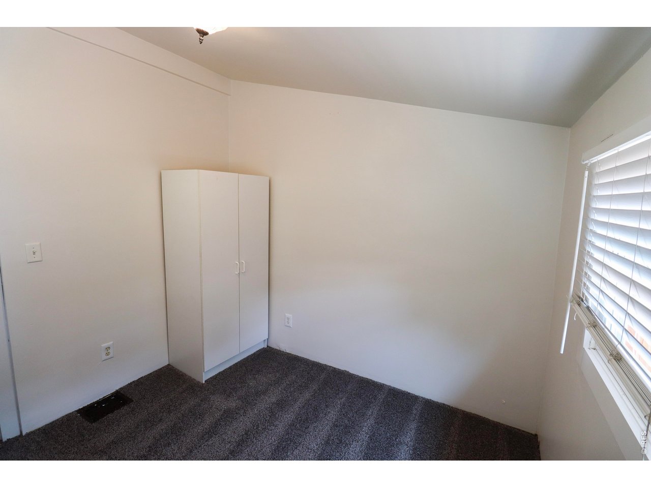608 South Howes Street Fort Collins, CO 80521 - Photo 16 of 28 a view of an empty room and window