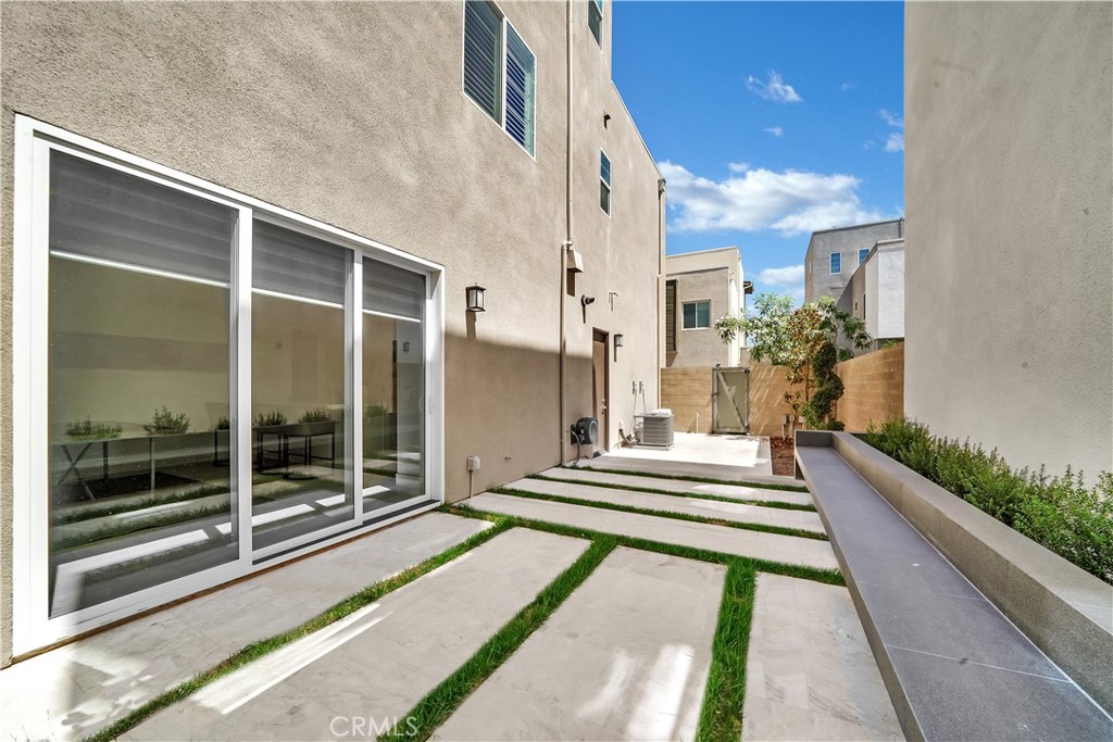 249 Chorus Irvine, CA 92618 - Photo 14 of 37 a view of building with wooden floor and potted plant