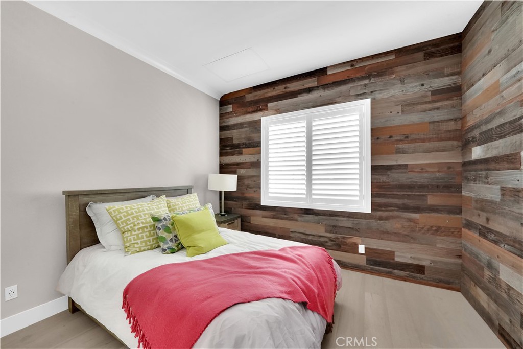 249 Chorus Irvine, CA 92618 - Photo 24 of 37 a bedroom with a bed and a window