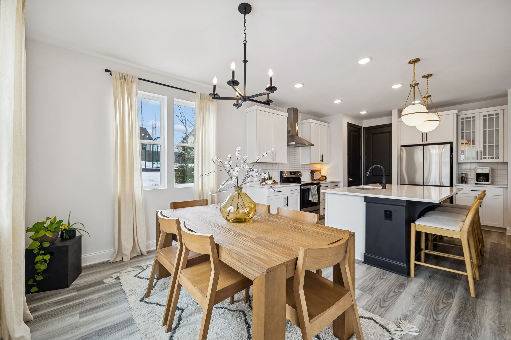 117 Timber Crest Trail White Bluff, TN 37187 - Photo 12 of 39 a view of a dining room with furniture and wooden floor