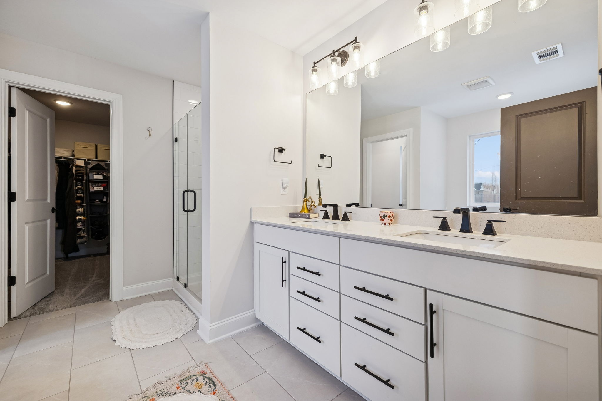 117 Timber Crest Trail White Bluff, TN 37187 - Photo 26 of 39 a bathroom with a double vanity sink double and a mirror