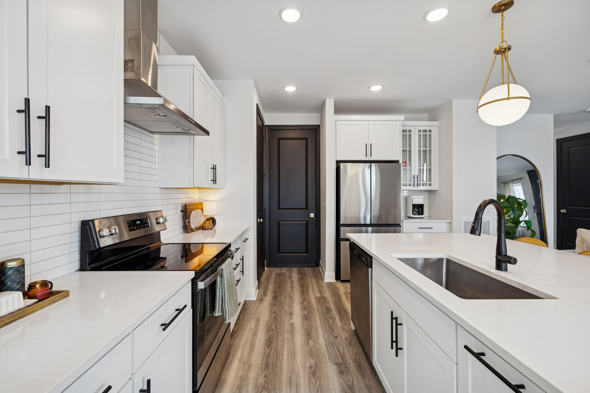 117 Timber Crest Trail White Bluff, TN 37187 - Photo 10 of 39 a kitchen with stainless steel appliances a sink stove and refrigerator