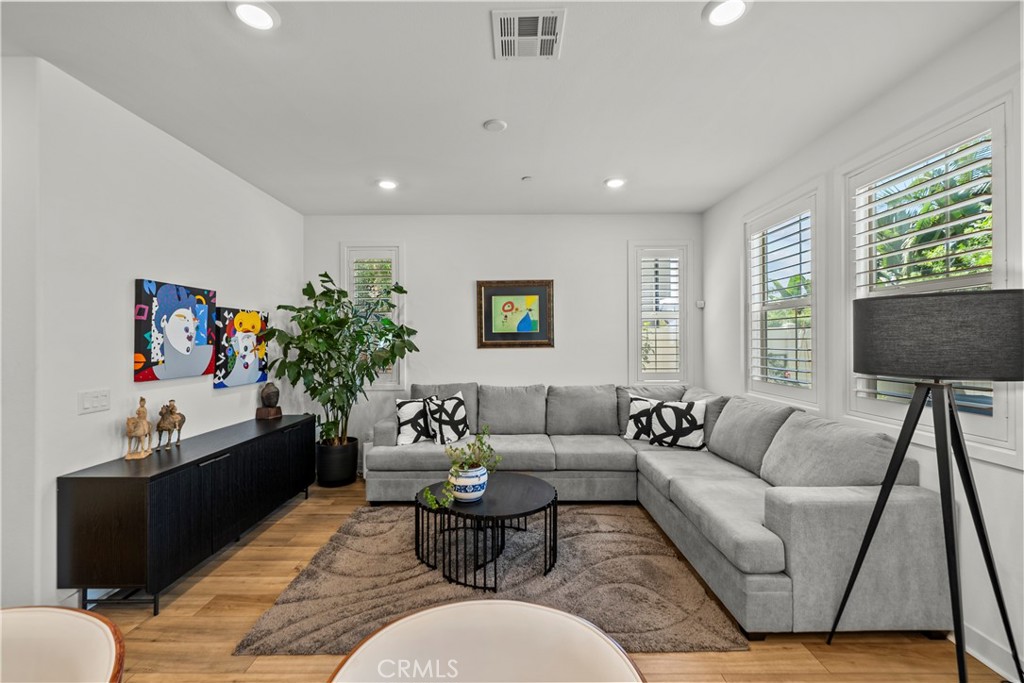 1663 Rosewell Road West Covina, CA 91791 - Photo 12 of 45 a living room with furniture and a couch