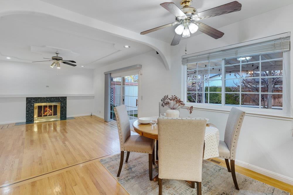 755 Cumberland Drive Gilroy, CA 95020 - Photo 14 of 52 a view of a dining room with furniture window and wooden floor