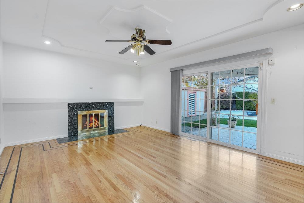 755 Cumberland Drive Gilroy, CA 95020 - Photo 17 of 52 a view of empty room with wooden floor and fan