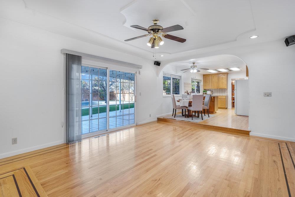 755 Cumberland Drive Gilroy, CA 95020 - Photo 19 of 52 a view of livingroom with furniture wooden floor and a ceiling fan
