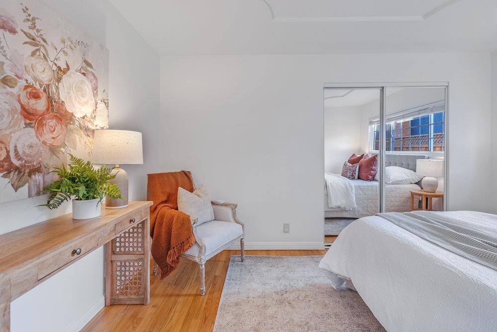 755 Cumberland Drive Gilroy, CA 95020 - Photo 22 of 52 a bed room with a bed and a potted plant