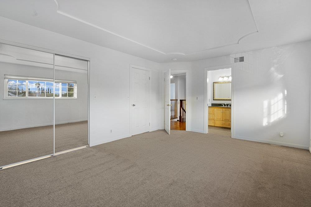 755 Cumberland Drive Gilroy, CA 95020 - Photo 31 of 52 a view of an empty room with a window