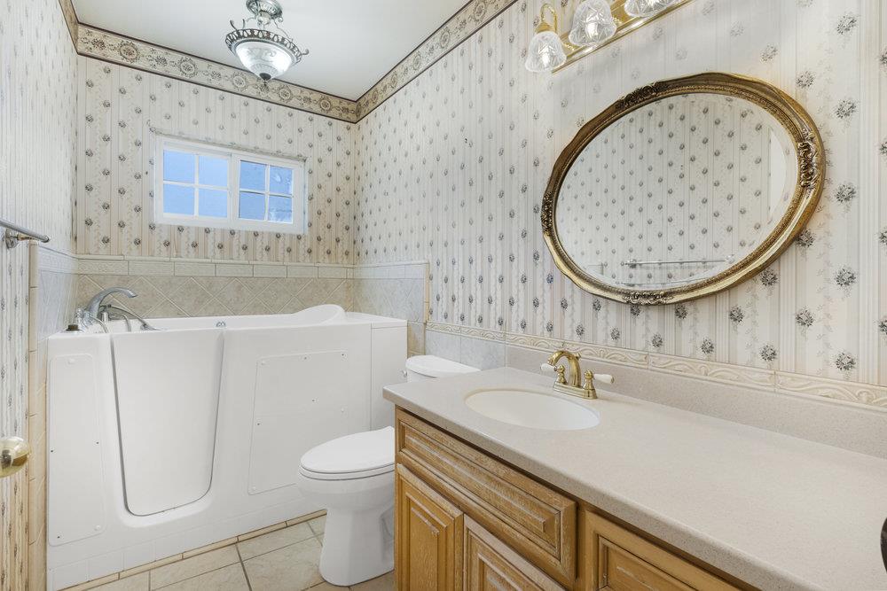 755 Cumberland Drive Gilroy, CA 95020 - Photo 34 of 52 a bathroom with a sink a toilet and a mirror