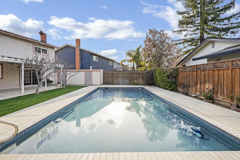 755 Cumberland Drive Gilroy, CA 95020 - Photo 41 of 52 a view of a backyard with a large tree