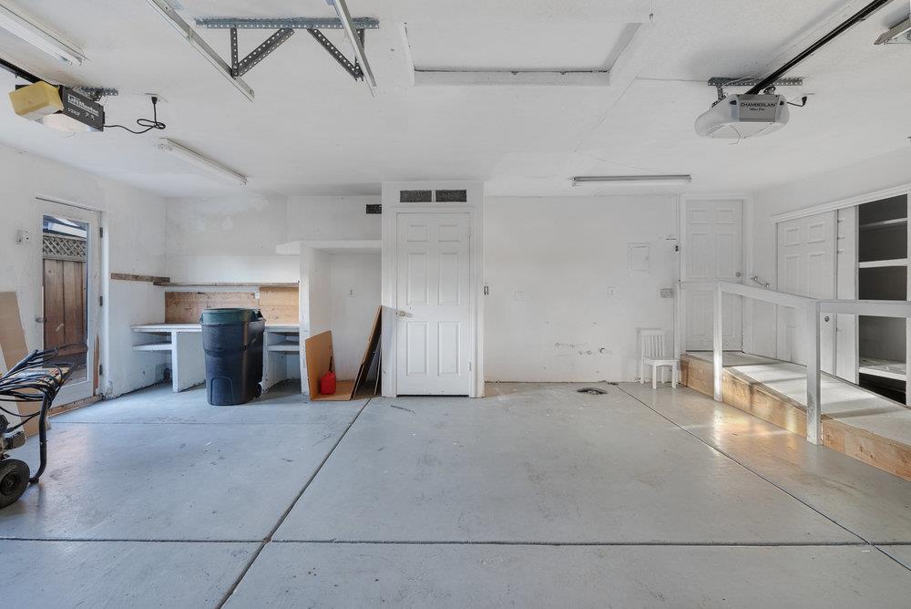 755 Cumberland Drive Gilroy, CA 95020 - Photo 48 of 52 a big room with chandelier and stainless steel appliances