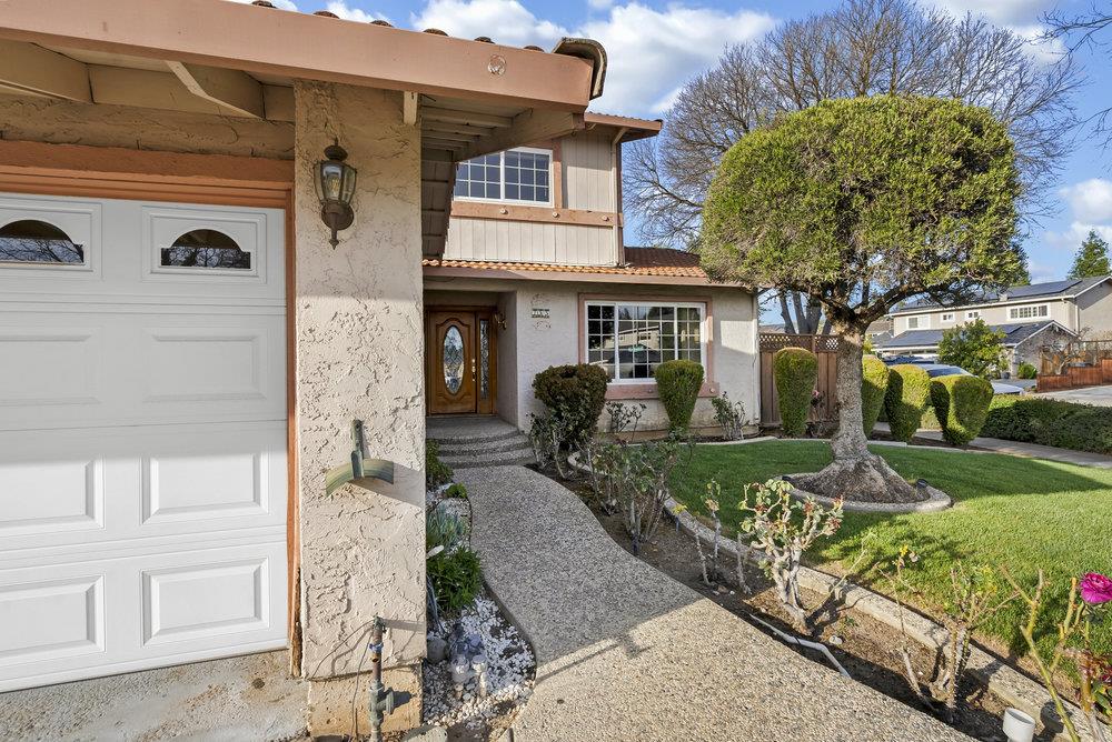 755 Cumberland Drive Gilroy, CA 95020 - Photo 5 of 52 a front view of a house with garden