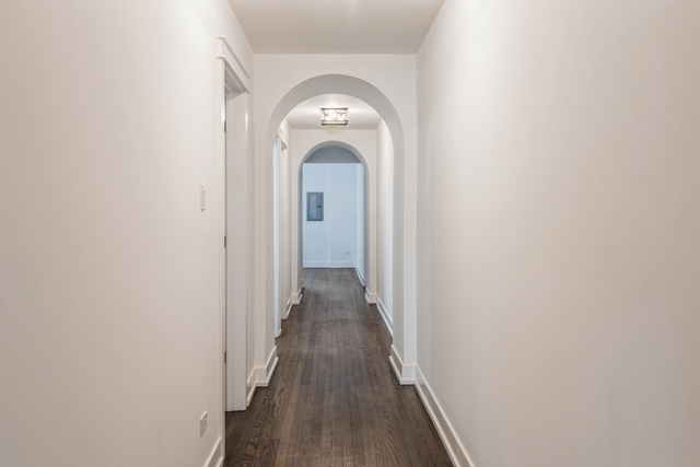 1535 West Estes Avenue, Unit 3 Chicago, IL 60626 - Photo 11 of 40 a view of a hallway with wooden floor