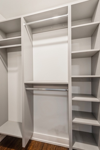 1535 West Estes Avenue, Unit 3 Chicago, IL 60626 - Photo 21 of 40 a view of walk in closet with empty racks