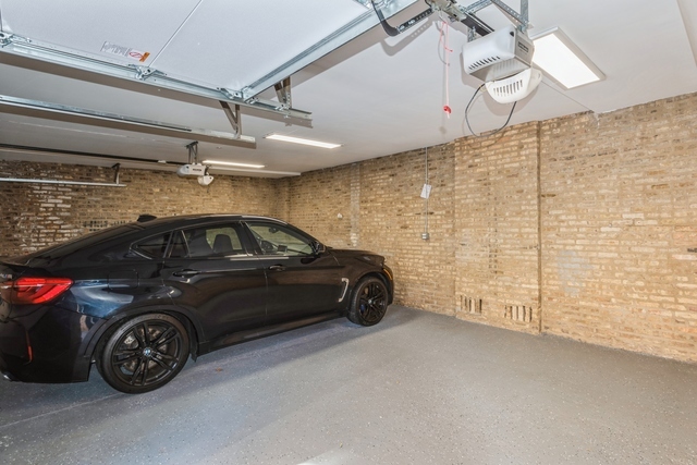 1535 West Estes Avenue, Unit 3 Chicago, IL 60626 - Photo 38 of 40 a view of a car in garage