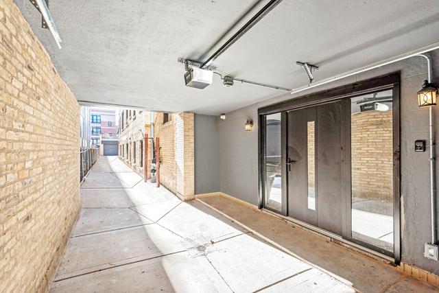 1535 West Estes Avenue, Unit 3 Chicago, IL 60626 - Photo 39 of 40 a view of a room with windows