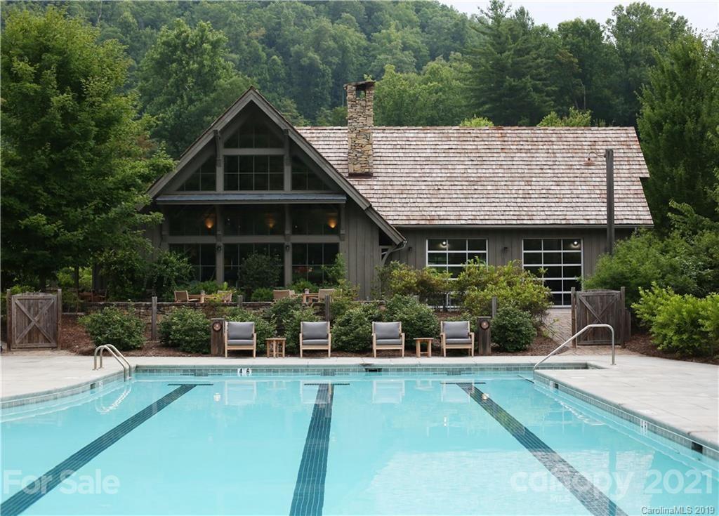 148 Preserve Road, Unit 148 Sylva, NC 28779 - Photo 9 of 11 a view of house and outdoor space with swimming pool