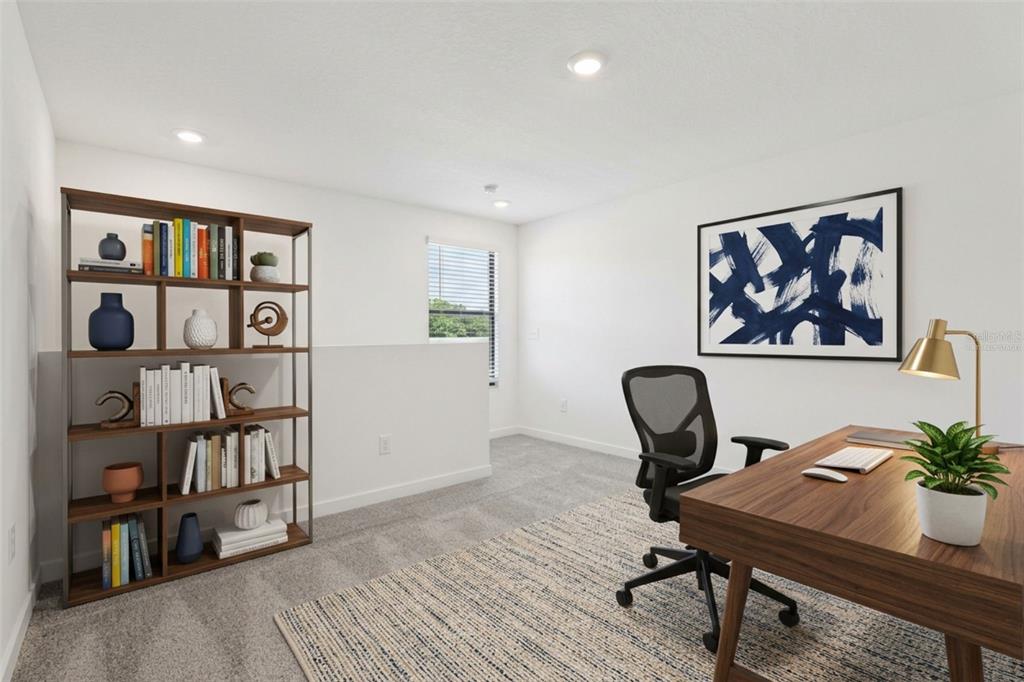 12249 Shafton Road Spring Hill, FL 34608 - Photo 11 of 12 a view of a workspace with furniture and lounge chair