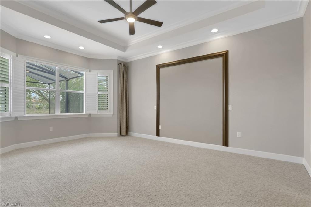 6482 Warwick Avenue Naples, FL 34113 - Photo 21 of 50 a view of an empty room with a window